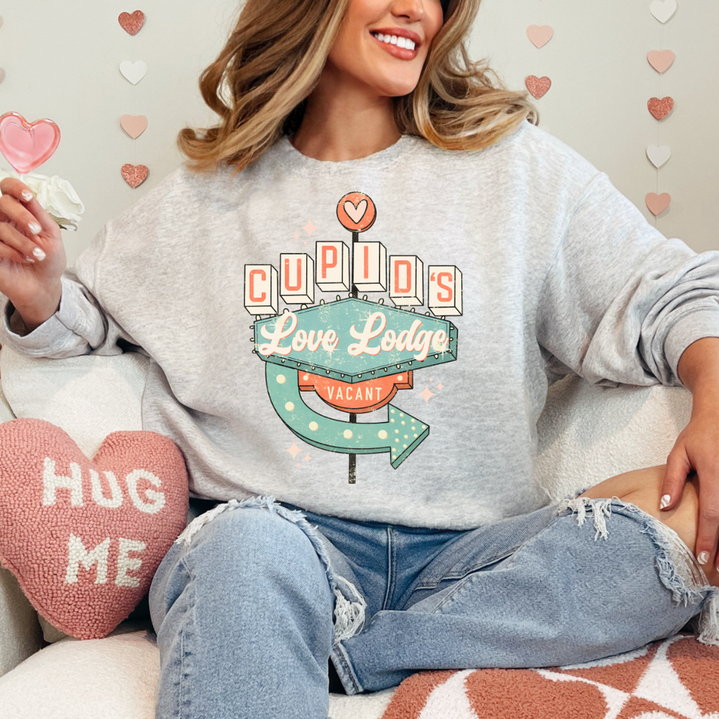 Cupid's Love Lodge Graphic Ladies Crewneck Sweater