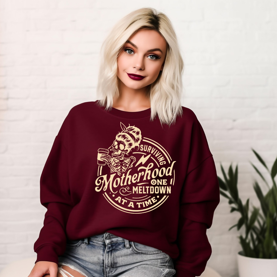 "Surviving Motherhood, One Meltdown About A Time" Graphic Ladies Crewneck Sweater